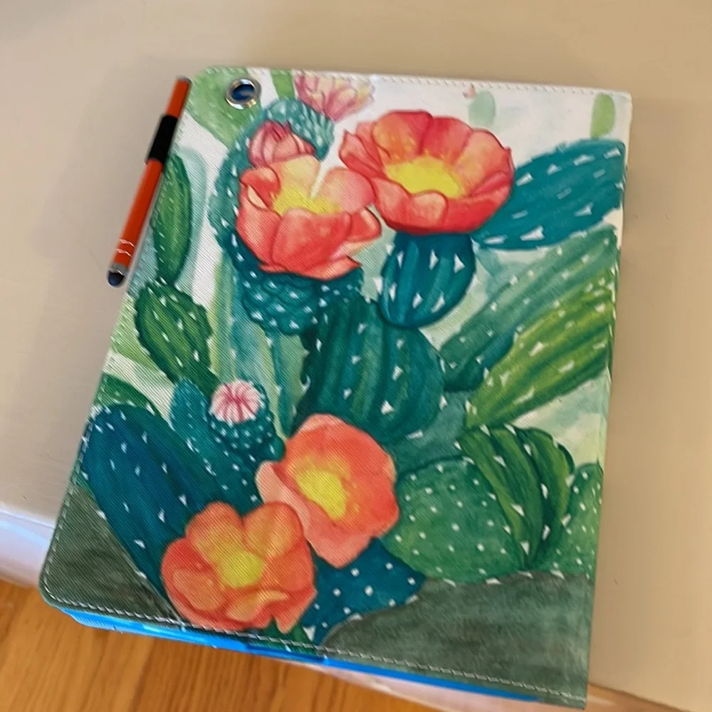 iPad cover 7 1/2” wide x 10” never used.